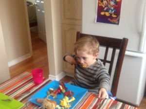 Henry eating some late breakfast. I also want to point out the photographic proof that he does eat scrambled eggs even though he always refuses ours.
