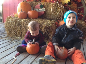 posing for pictures in front of the pumpkins. I took a picture of Henry and his friend Avery at this very spot 2 years ago. How time flies!